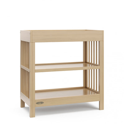 Graco Teddi Changing Table with Water-Resistant Changing Pad - Driftwood | Table a langer Graco Teddi avec matelas a langer resistant a l’eau – Bois flotte