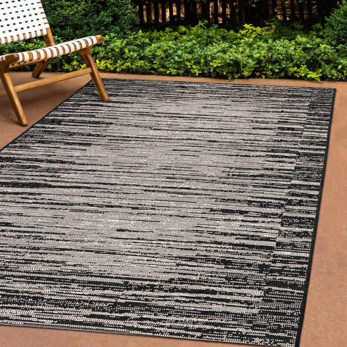 Jackson Black Grey Distressed Outdoor Rug, 6'7\" x 9'6\" Outdoor Area Rug