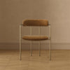 Serene Mid-Century Modern Metal Upholstered Dining Chair in Turmeric | Chaise de salle a manger moderne mi-siecle en metal et tissu, coloris curcuma
