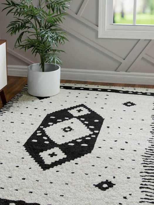 Lyra Contemporary 5'3\" x 7'2\" Area Rug in Ivory Indoor Area Rug