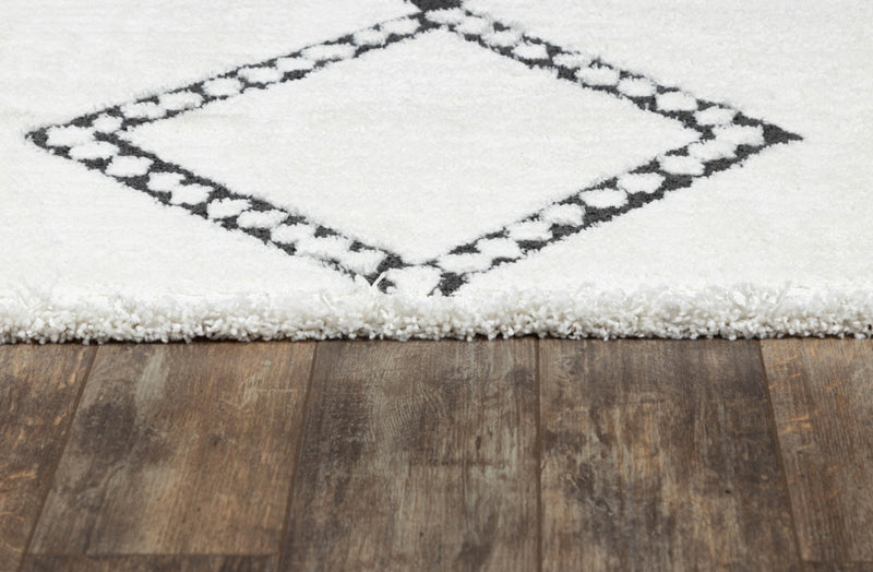 Zelda Contemporary 5'3\" x 7'2\" Area Rug in Ivory Indoor Area Rug