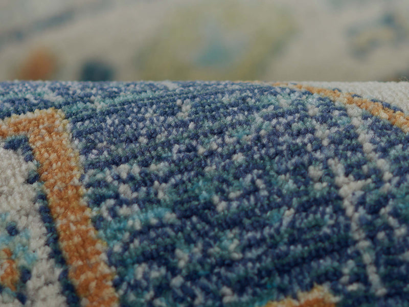 Kinsley Traditional 6'7\" x 9'6\" Area Rug in Blue Indoor Area Rug