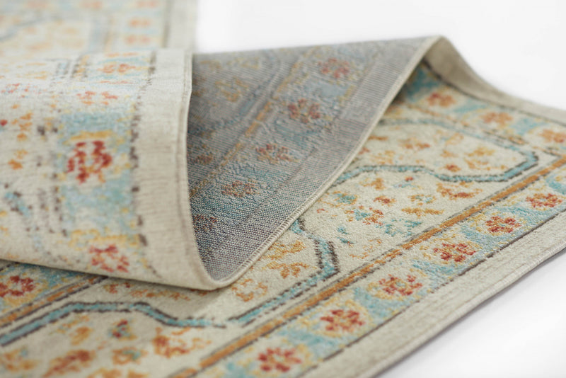 Esme Traditional 6'7\" x 9'6\" Area Rug in Ivory Indoor Area Rug