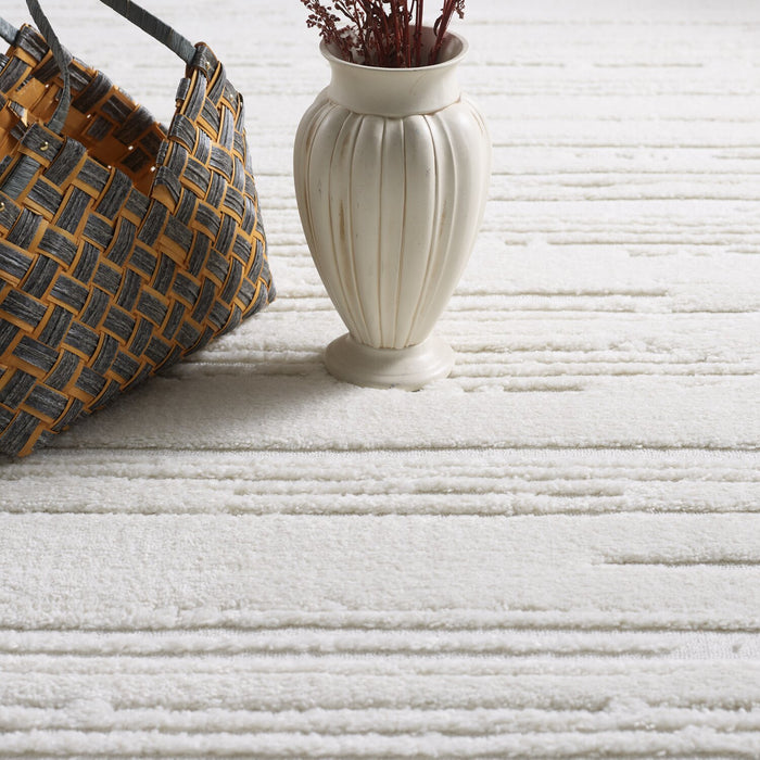 Riley Cream Abstract Area Rug - 6'3\" x 9'
