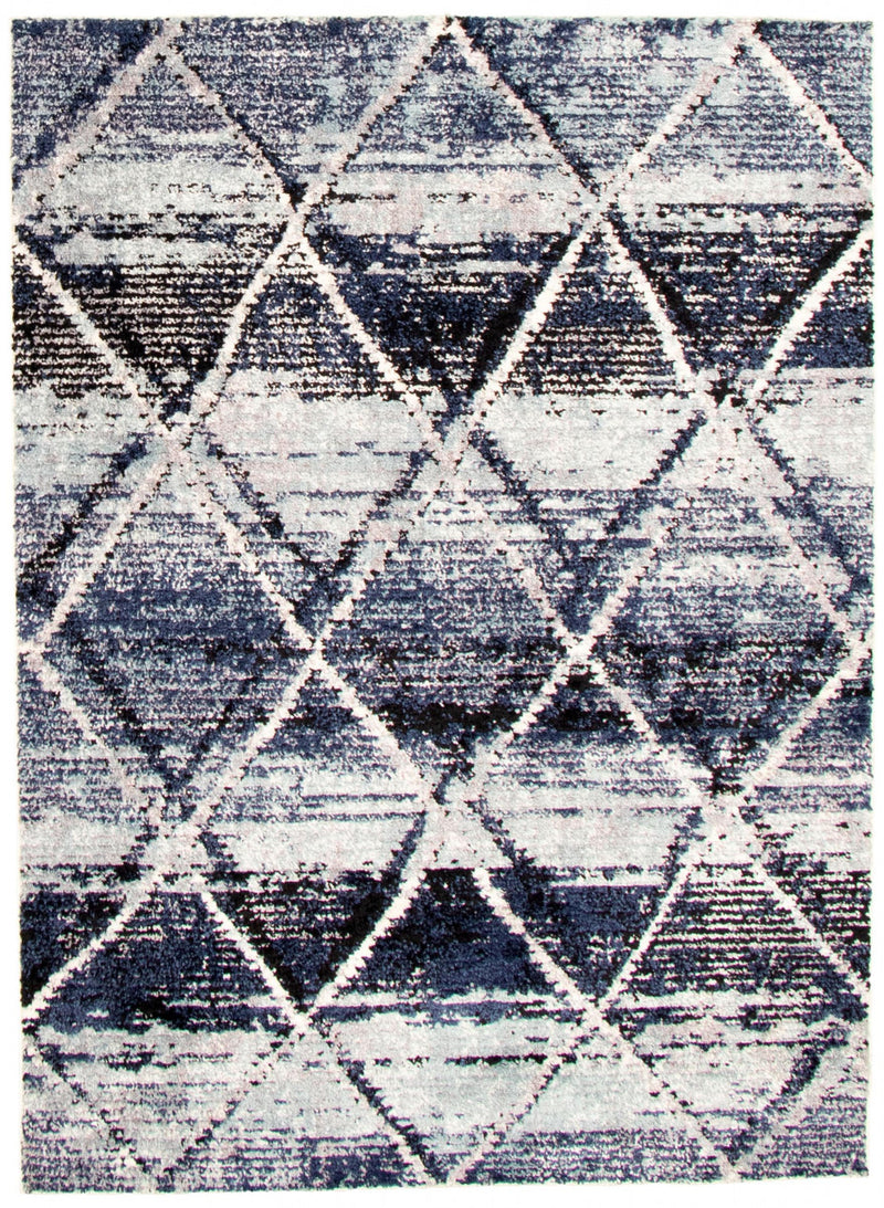 Makondo Abstract Blue Area Rug - 3'11" x 5'11"