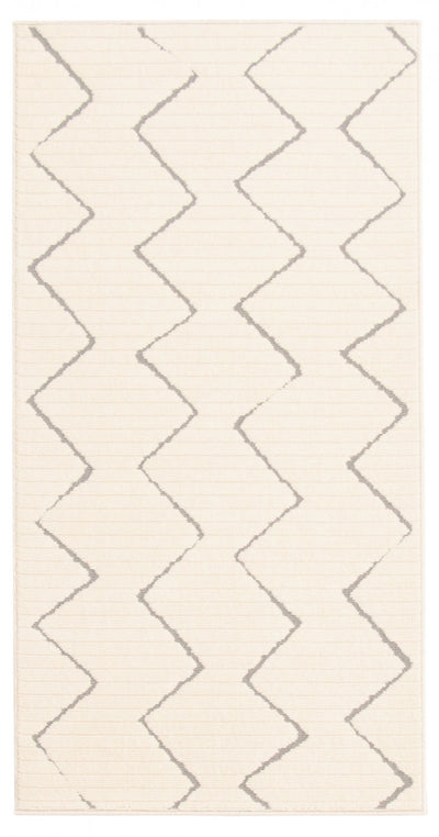 Kimi Ivory 2'8" x 4'11" Area Rug