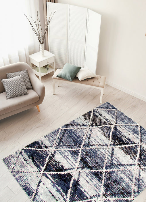 Makondo Abstract Blue Area Rug - 5'3\" x 7'3\"