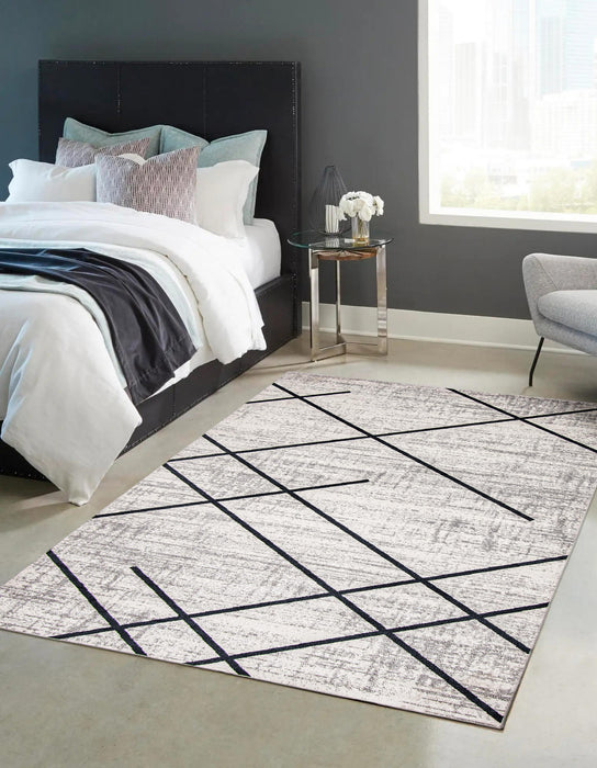 Damali Ivory/Blue Machine Washable Area Rug - 3'0\" x 5'0\"