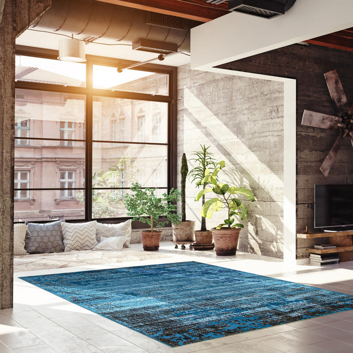 Janaki Blue 6'7\" x 9'6\" Area Rug