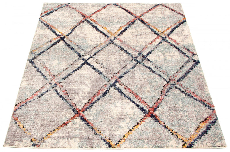 Makondo Abstract Ivory Area Rug - 3'11\" x 5'11\"