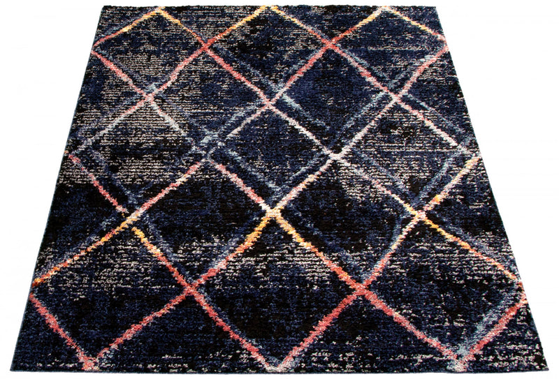 Makondo Abstract Navy Blue Area Rug - 6'7\" x 9'6\"
