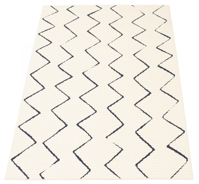 Kimi Blue-Ivory 6'7\" x 9'6\" Area Rug
