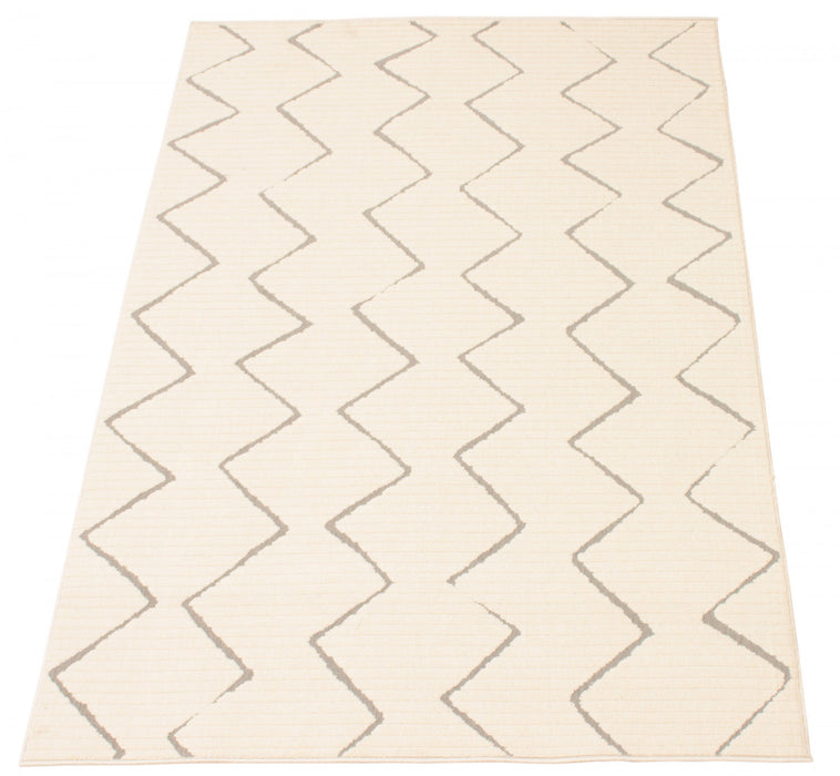 Kimi Ivory 6'7\" x 9'6\" Area Rug