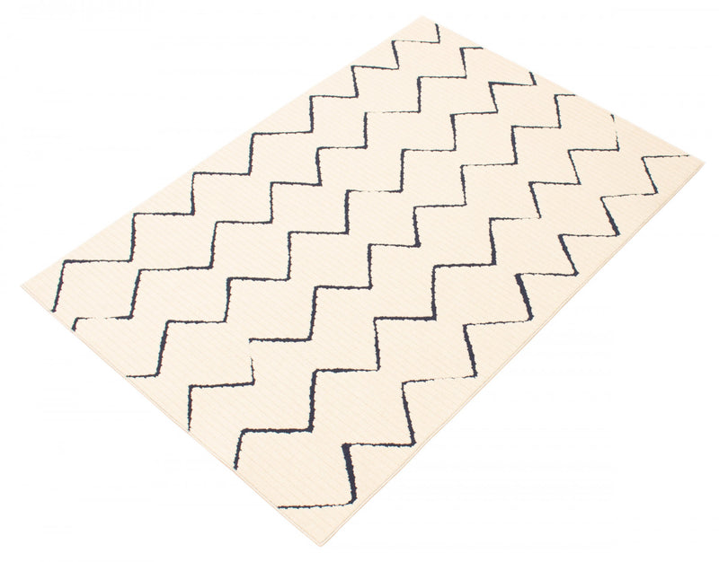 Kimi Blue-Ivory 6'7\" x 9'6\" Area Rug