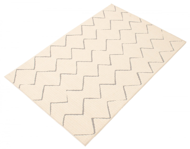Kimi Ivory 6'7\" x 9'6\" Area Rug