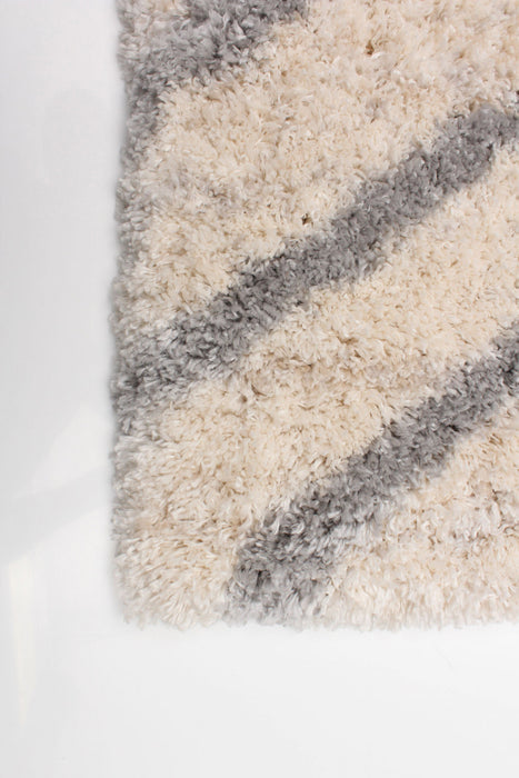 Miah Cream Area Rug - 3'11\" x 5'7\"