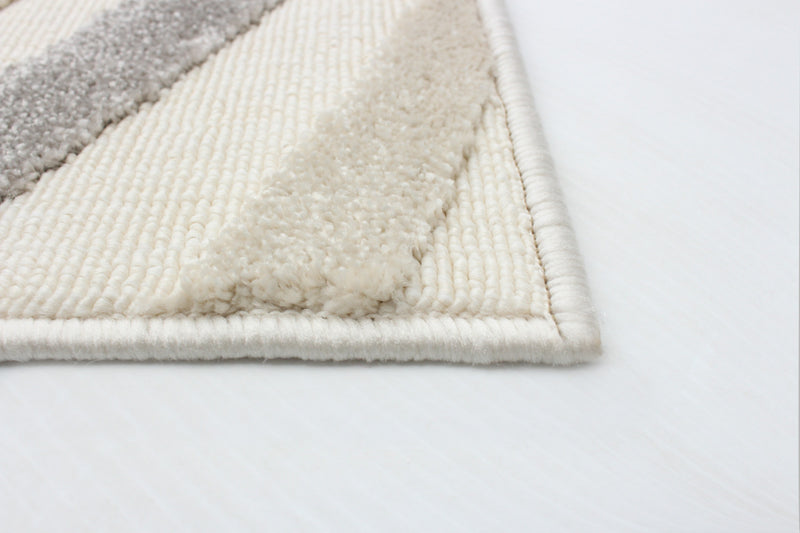 Nikkos Ivory 6'7\" x 9'6\" Area Rug