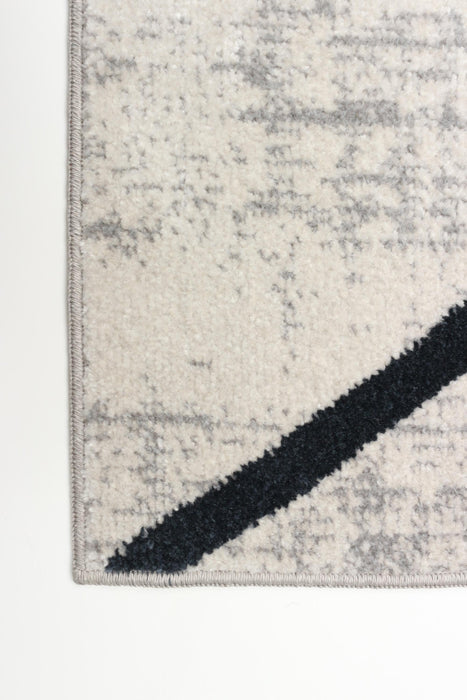 Damali Ivory/Blue Machine Washable Area Rug - 5'0\" x 7'0\"