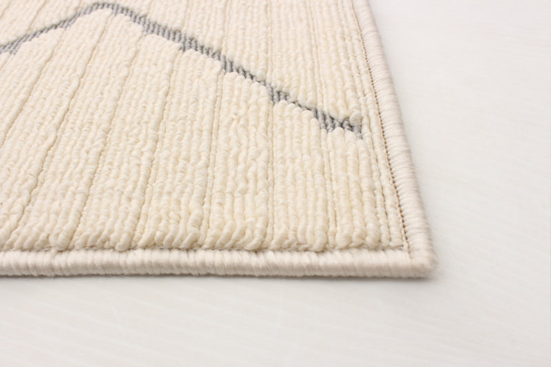 Kimi Ivory 6'7\" x 9'6\" Area Rug