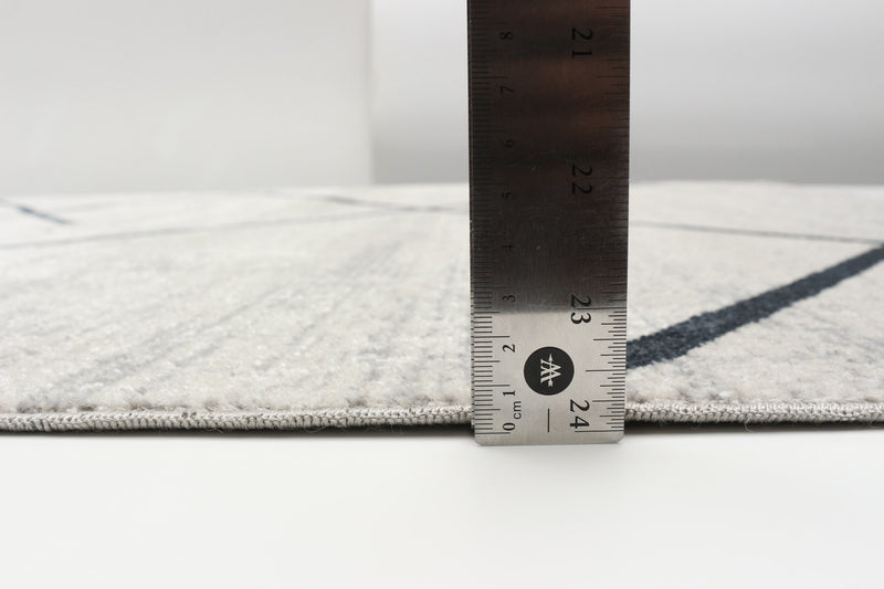 Damali Ivory/Blue Machine Washable Area Rug - 3'0\" x 5'0\"