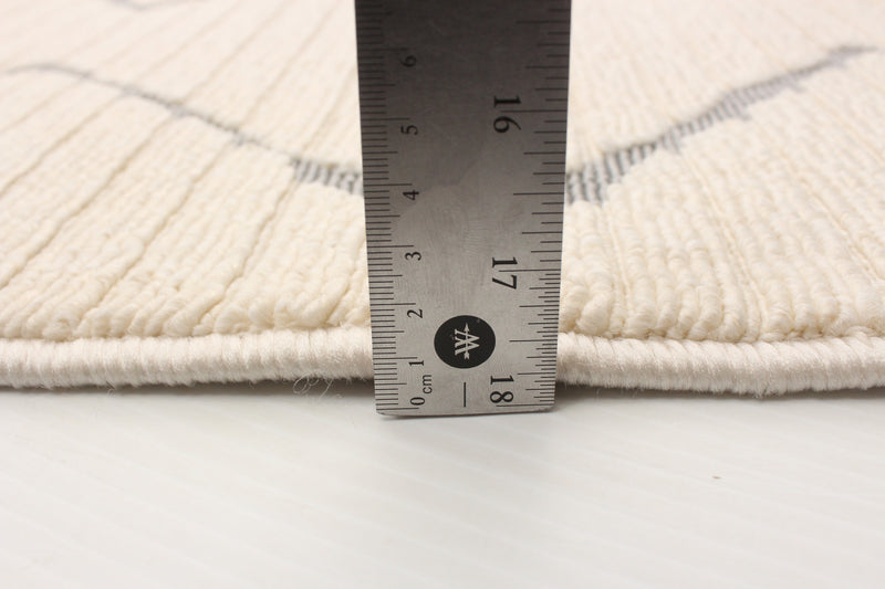 Kimi Ivory 6'7\" x 9'6\" Area Rug