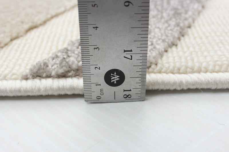 Nikkos Ivory 6'7\" x 9'6\" Area Rug