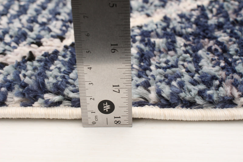 Makondo Abstract Blue Area Rug - 6'7\" x 9'6\"