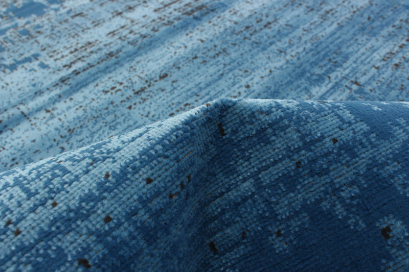 Janaki Blue 6'7\" x 9'6\" Area Rug