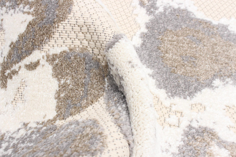 Angie Ivory Area Rug - 6'7\" X 9'6\" 