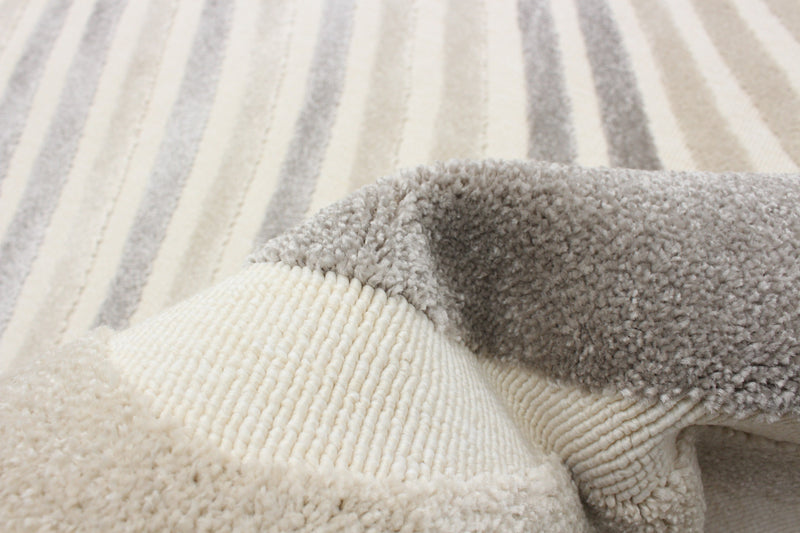 Nikkos Ivory 6'7\" x 9'6\" Area Rug