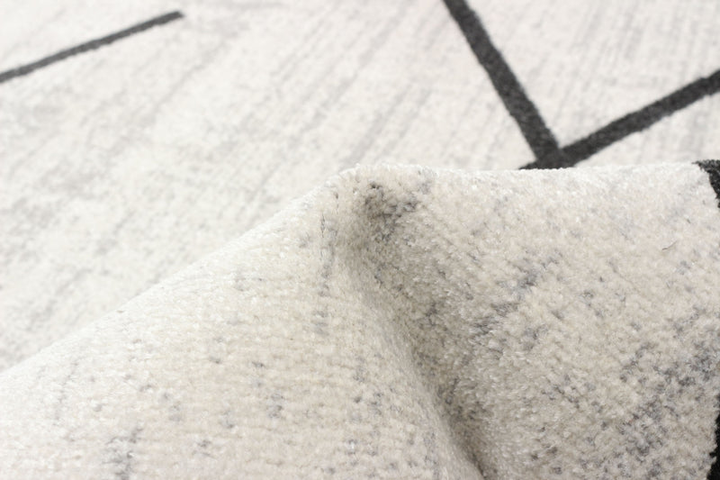 Damali Ivory/Black Machine Washable Area Rug - 8'0\" x 10'0\"