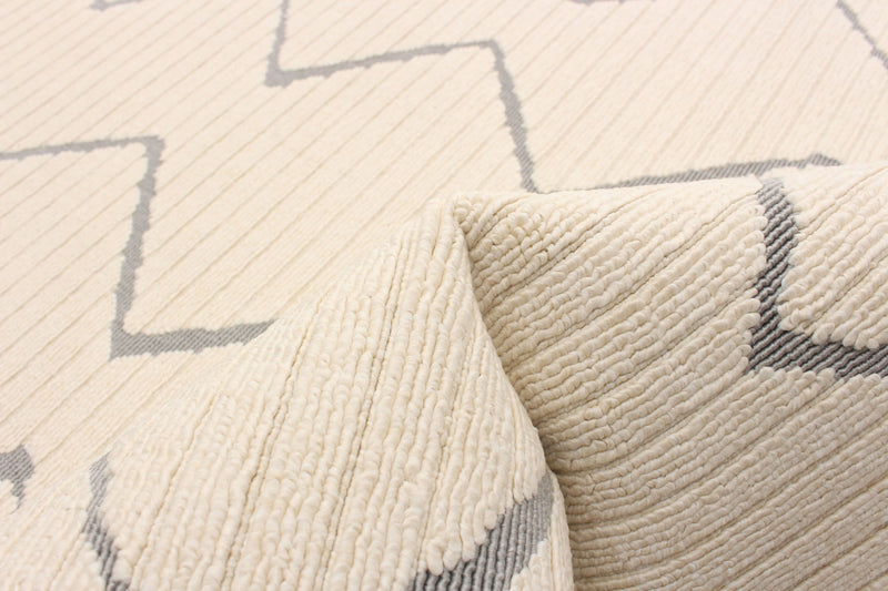 Kimi Ivory 6'7\" x 9'6\" Area Rug