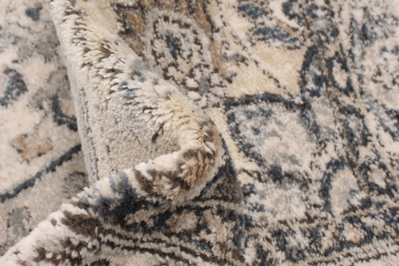 Octavian Tabriz Blue-Ivory Area Rug - 6'7\" x 9'6\"