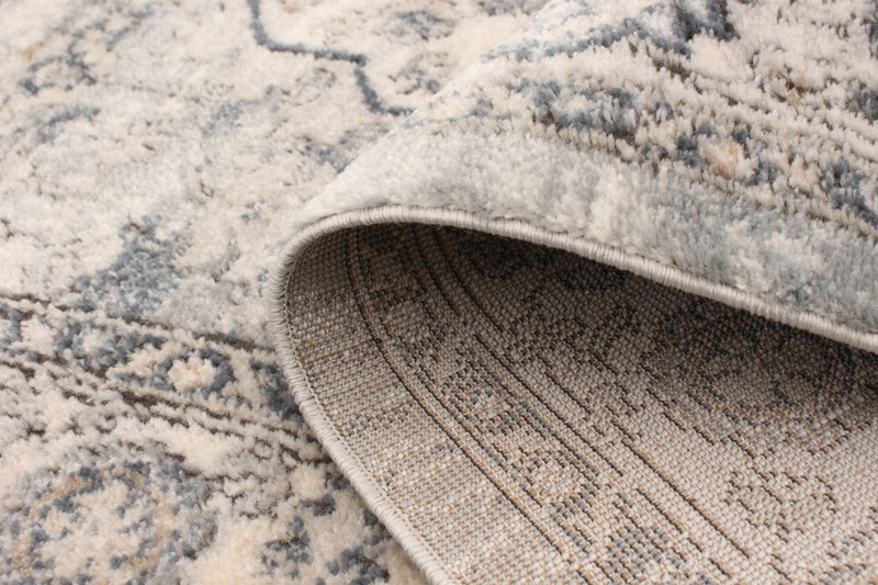 Octavian Tabriz Blue-Ivory Area Rug - 6'7\" x 9'6\"