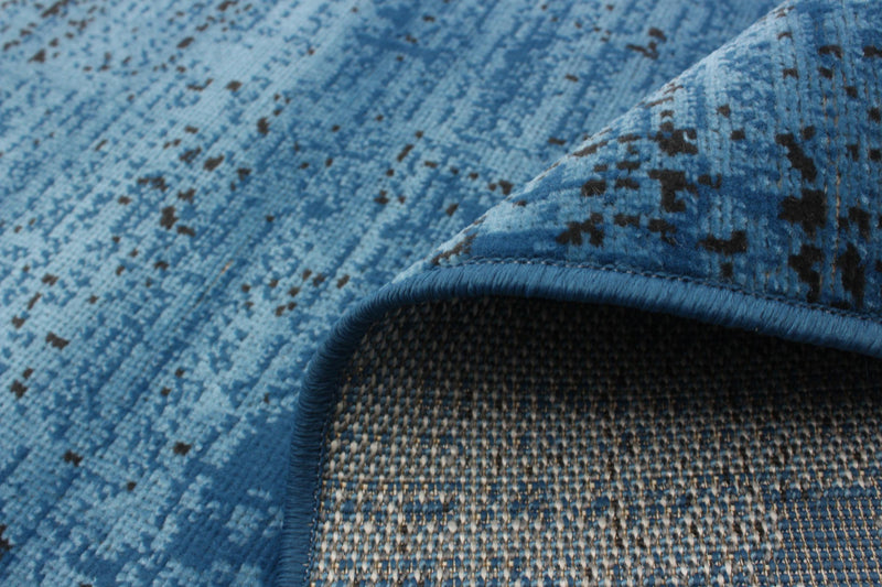 Janaki Blue 6'7\" x 9'6\" Area Rug