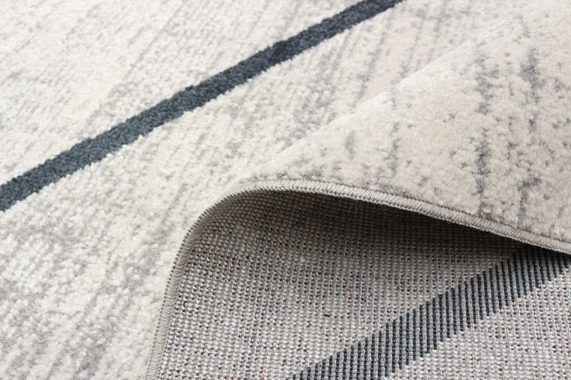 Damali Ivory/Blue Machine Washable Area Rug - 3'0\" x 5'0\"