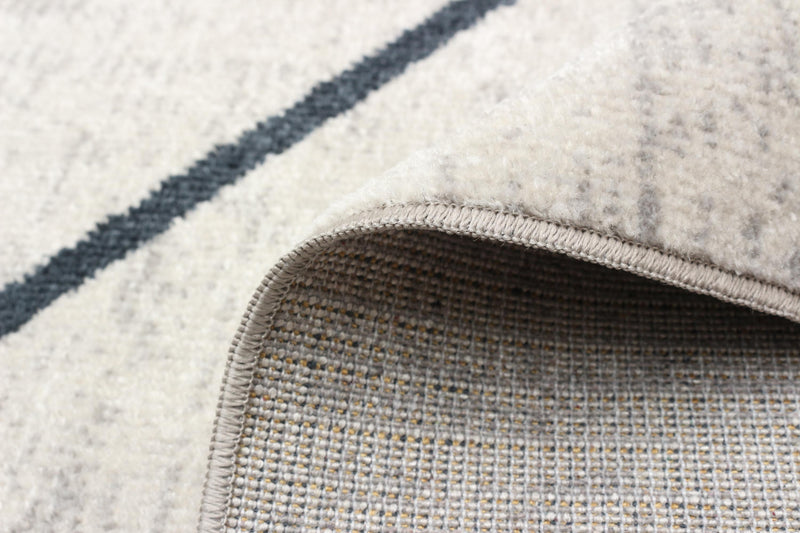 Damali Ivory/Blue Machine Washable Area Rug - 2'6\" x 8'0\"