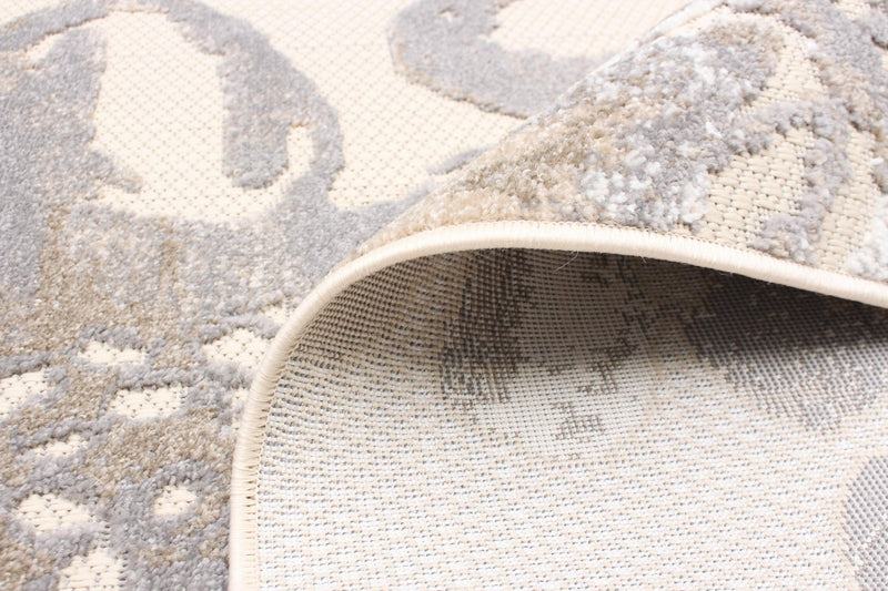 Angie Ivory Area Rug - 6'7\" X 9'6\" 